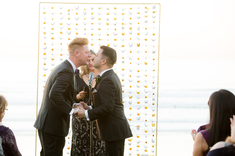 Grooms first kiss as a married couple