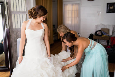 Bride getting dressed