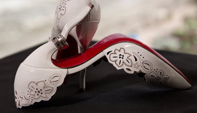 High heel shoes with wedding rings