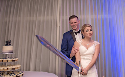 Bride holding a broad sword