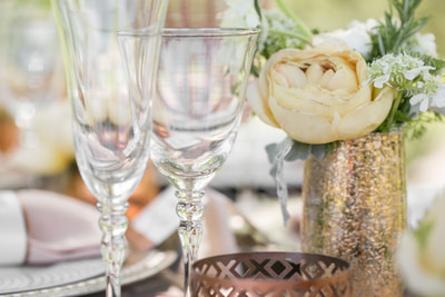 Wine glasses and floral decor